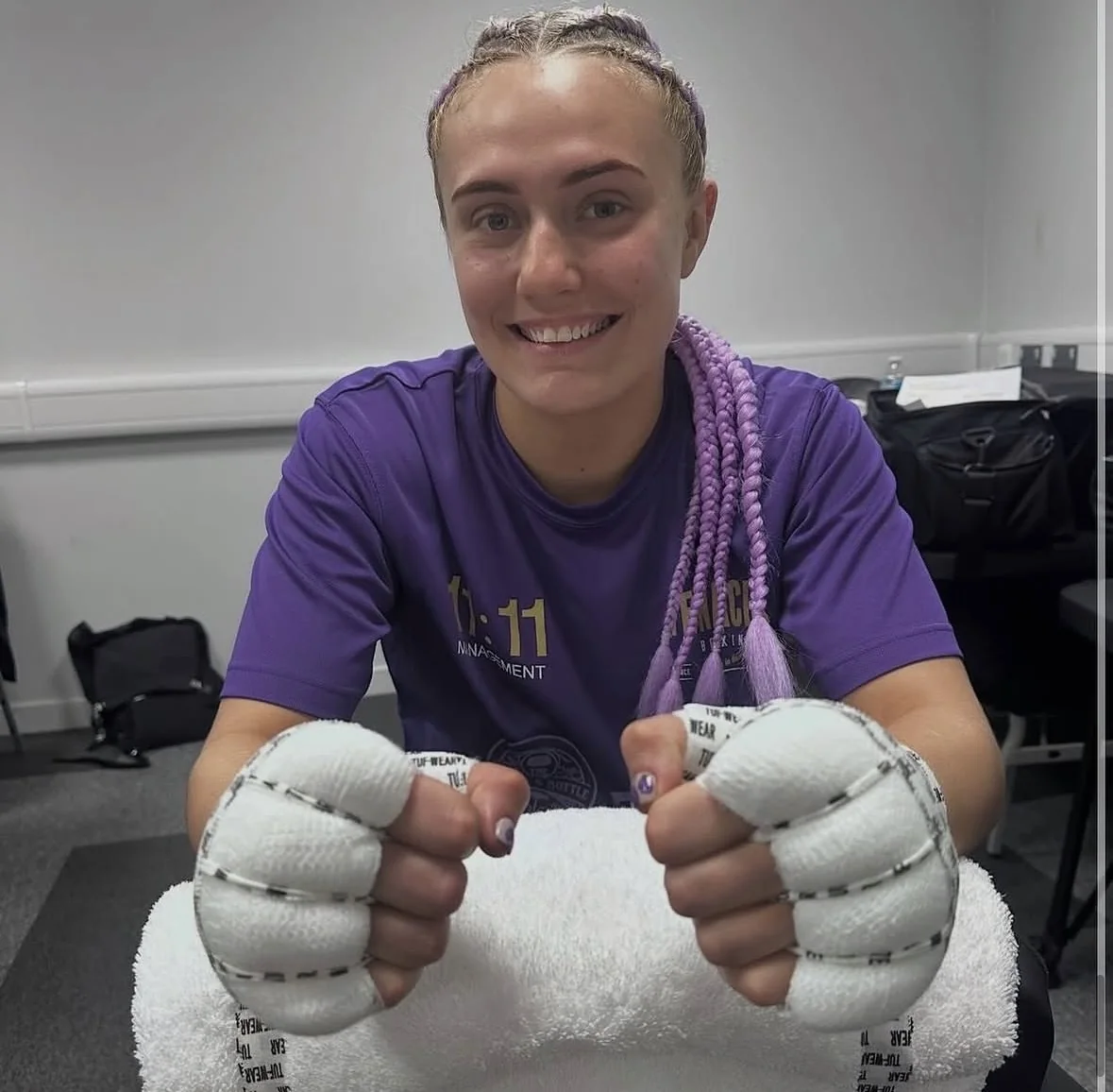 Gemma with wrapped hands before boxing
